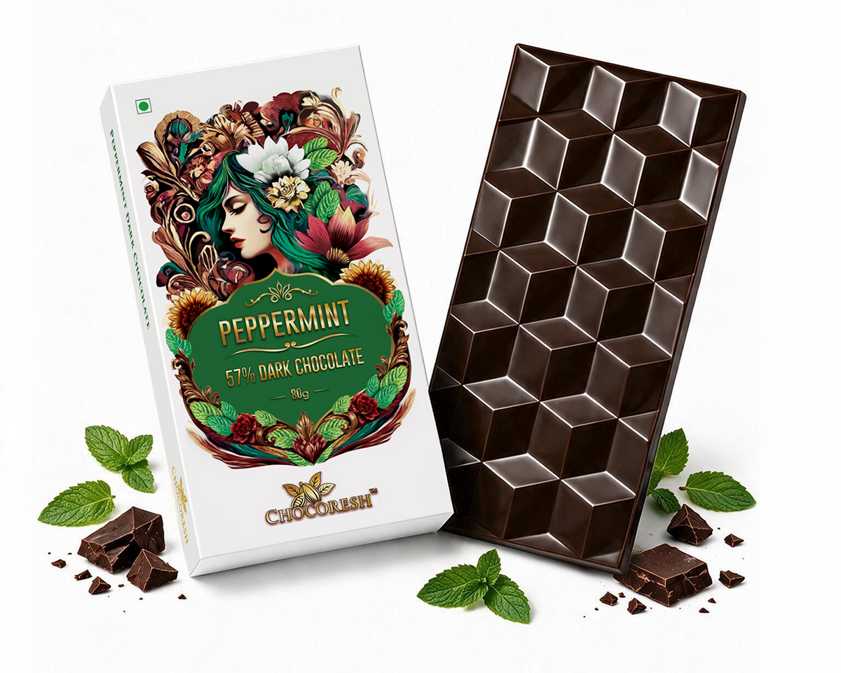 A bar of 5th Dark Chocolate Peppermint by Chocolini, shown with its illustrated white packaging box and a partially unwrapped dark chocolate bar, styled with mint leaves and chocolate chunks on a white background.